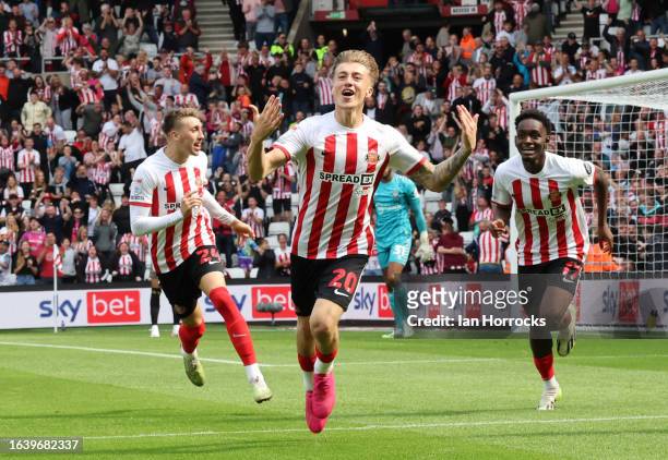 Jack Clarke of Sunderland celebrates with his teammates after scoring the opening goal during the Sky Bet Championship match between Sunderland and...