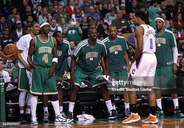 Boston Celtics players Paul Pierce , Avery Bradley, and Jeff Green looked as if they wanted to get back into the game as Boston Celtics shooting...