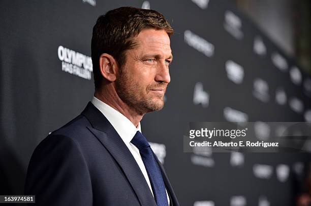 Actor Gerard Butler arrives at the premiere of FilmDistrict's "Olympus Has Fallen" at ArcLight Cinemas Cinerama Dome on March 18, 2013 in Hollywood,...