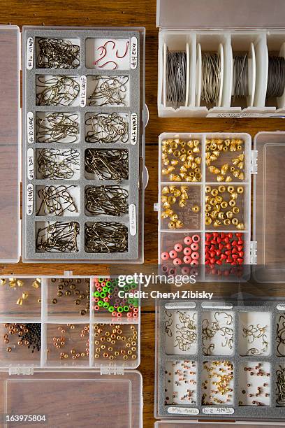 materials for making fly fishing flies - fishing tackle box stock pictures, royalty-free photos & images