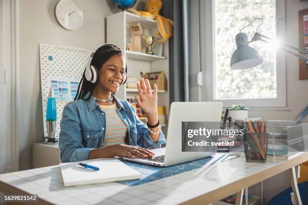 teenage girl studding at home - e learning stock pictures, royalty-free photos & images