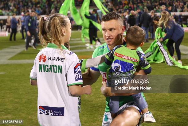 Jack Wighton of the Raiders runs onto the field with his children during the round 26 NRL match between Canberra Raiders and Brisbane Broncos at GIO...