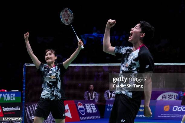 Seo Seung Jae and Chae Yu Jung of Korea celebrate the victory in the Mixed Doubles Semi Finals match against Yuta Watanabe and Arisa Higashino of...