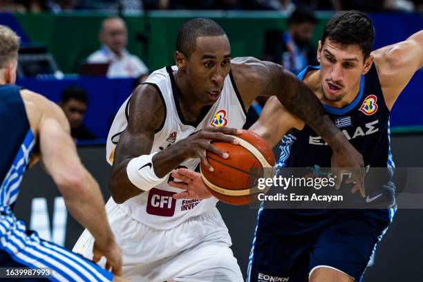 Rondae Hollis Jefferson of Jordan competes against Giannoulis Larentzakis of Greece during the FIBA Basketball World Cup Group C game between Jordan...