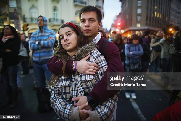 Argentinians gather in Plaza de Mayo while watching a live broadcast of the inauguration of Pope Francis in Saint Peter's Square on March 19, 2013 in...