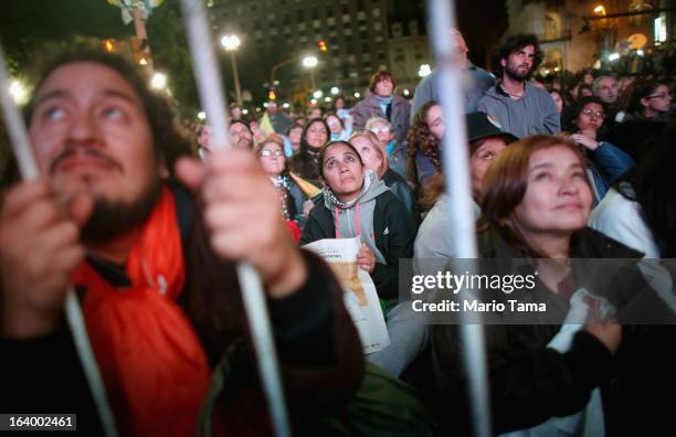 Argentinians gather in Plaza de Mayo while watching a live broadcast of the inauguration of Pope Francis in Saint Peter's Square on March 19, 2013 in...