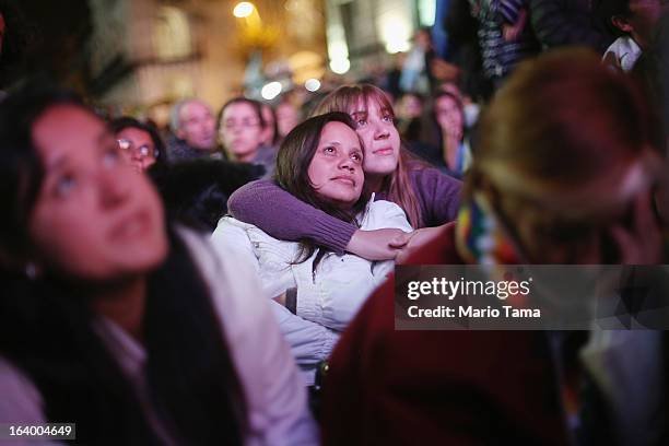 Argentinians gather in Plaza de Mayo while watching a live broadcast of the inauguration of Pope Francis in Saint Peter's Square on March 19, 2013 in...