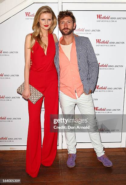 Candice Lake and Daimon Downey pose at the Westfield Autumn/Winter 2013 launch at Pelicano Bar on March 19, 2013 in Sydney, Australia.