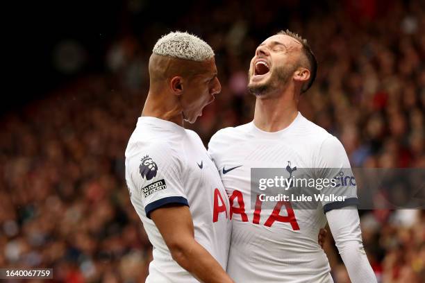 James Maddison of Tottenham Hotspur celebrates with Richarlison of Tottenham Hotspur after scoring the team's first goal during the Premier League...