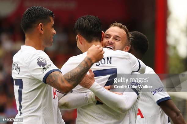 James Maddison of Tottenham Hotspur celebrates with Heung-Min Son of Tottenham Hotspur after scoring the team's first goal during the Premier League...