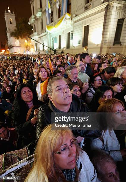 Argentinians gather in Plaza de Mayo while watching a live broadcast of the inauguration of Pope Francis in Saint Peter's Square on March 19, 2013 in...