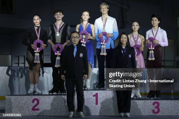 Silver medalists Celina Fradji and Jean-Hans Fourneaux of France, gold medalists Leah Neset and Artem Markelov of United States, bronze medalists...