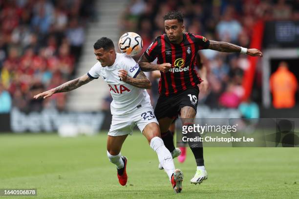 Pedro Porro of Tottenham Hotspur and Justin Kluivert of AFC Bournemouth battle for the ball during the Premier League match between AFC Bournemouth...