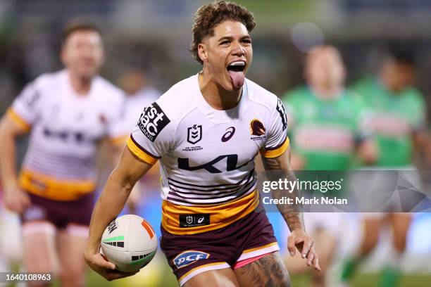 Reece Walsh of the Broncos heads to the try line to score during the round 26 NRL match between Canberra Raiders and Brisbane Broncos at GIO Stadium...