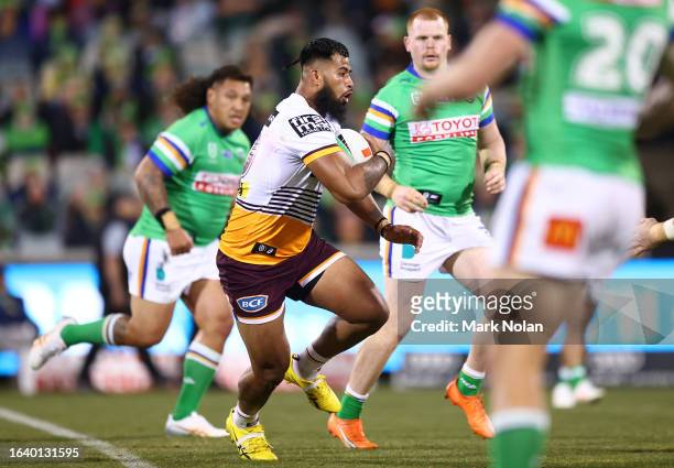 Payne Haas of the Broncos is tackled during the round 26 NRL match between Canberra Raiders and Brisbane Broncos at GIO Stadium on August 26, 2023 in...