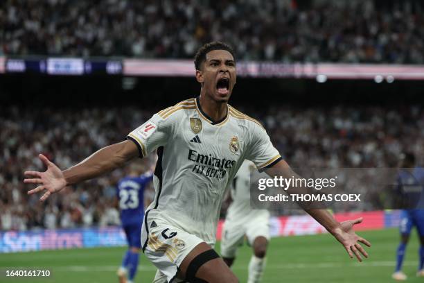 Real Madrid's English midfielder Jude Bellingham celebrates after scoring his team's second goal during the Spanish Liga football match between Real...