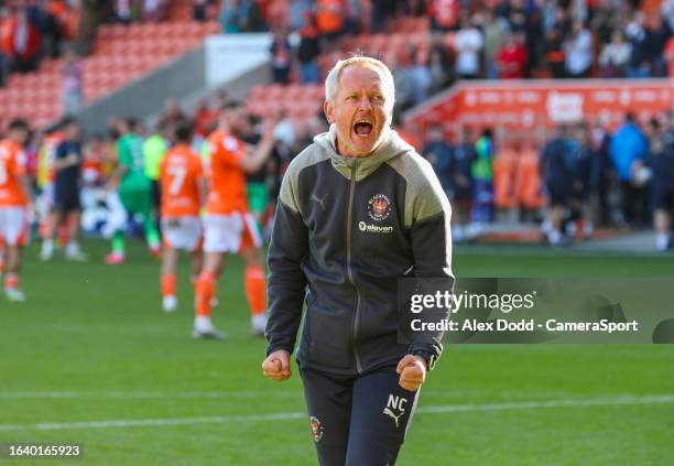 Blackpool manager Neil Critchley celebrates after the Sky Bet League One match between Blackpool and Wigan Athletic at Bloomfield Road on September...