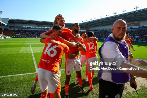 Blackpool celebrate their late winner during the Sky Bet League One match between Blackpool and Wigan Athletic at Bloomfield Road on September 2,...