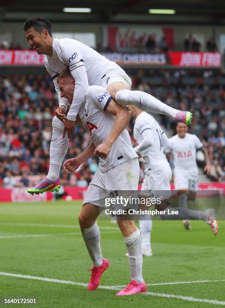 Dejan Kulusevski of Tottenham Hotspur celebrates with Heung-Min Son of Tottenham Hotspur after scoring the team's second goal during the Premier...