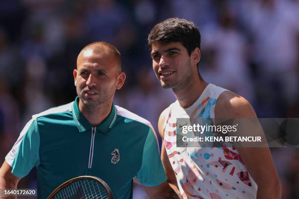 Spain's Carlos Alcaraz poses with Britain's Daniel Evans before their US Open tennis tournament men's singles third round match at the USTA Billie...