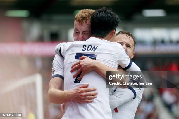 Dejan Kulusevski of Tottenham Hotspur celebrates with Heung-Min Son and James Maddison of Tottenham Hotspur after scoring the team's second goal...