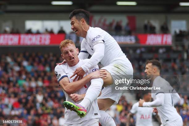 Dejan Kulusevski of Tottenham Hotspur celebrates with Heung-Min Son of Tottenham Hotspur after scoring the team's second goal during the Premier...