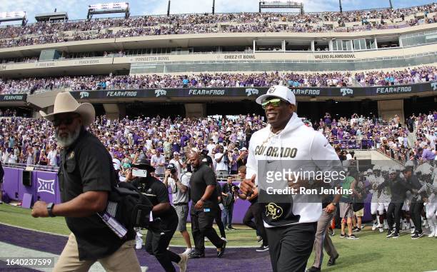 Head coach Deion Sanders of the Colorado Buffaloes takes the field before the game against the TCU Horned Frogs at Amon G. Carter Stadium on...
