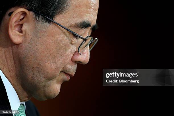 Masaaki Shirakawa, outgoing governor of the Bank of Japan, attends a news conference at the central bank's headquarters in Tokyo, Japan, on Tuesday,...