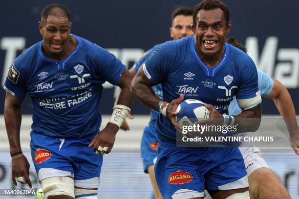 Castres' Fijian lock Leone Nakarawa runs with the ball during the French Top14 rugby union match between Castres Olympique and Bayonne at the...