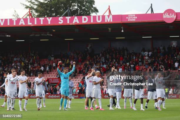 The players of Tottenham Hotspur applaud the fans as they celebrate following the team's victory in during the Premier League match between AFC...