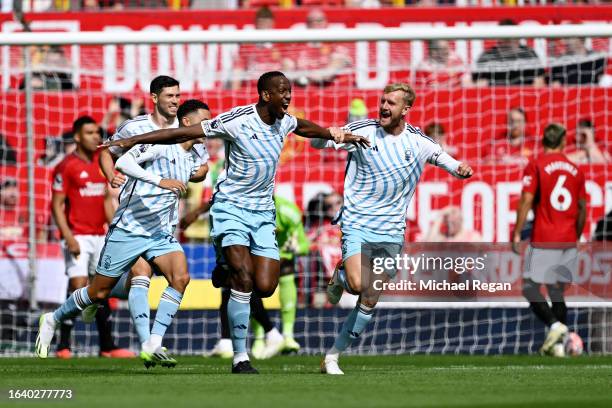 Willy Boly of Nottingham Forest celebrates with Joe Worrall of Nottingham Forest after scoring the team's second goal during the Premier League match...