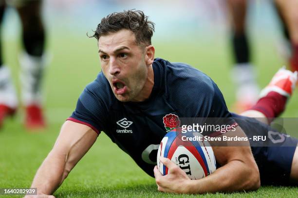 Jonny May of England scores the team's first try during the Summer International match between England and Fiji at Twickenham Stadium on August 26,...
