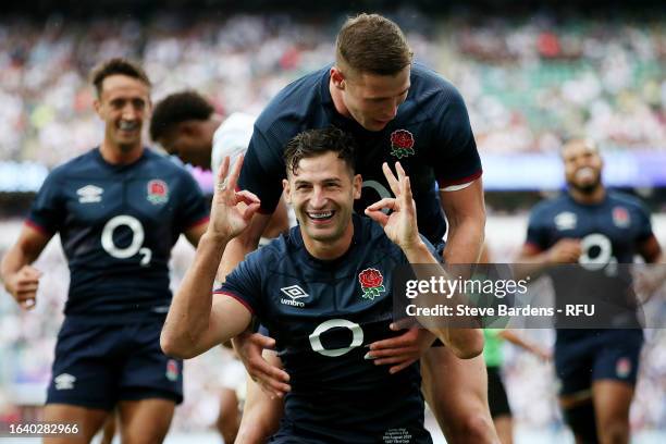 Jonny May of England celebrates after scoring the team's first try during the Summer International match between England and Fiji at Twickenham...