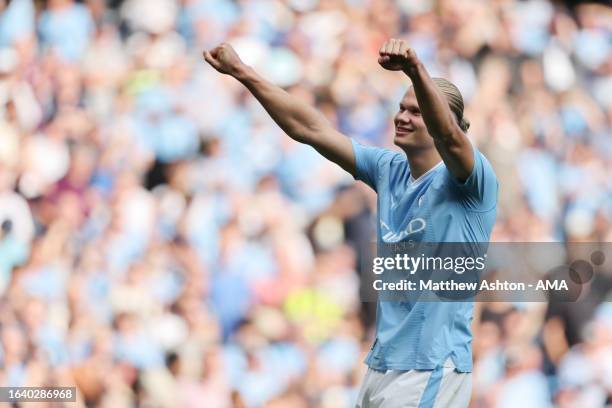 Erling Haaland of Manchester City celebrates after scoring a goal to make it 4-1 during the Premier League match between Manchester City and Fulham...