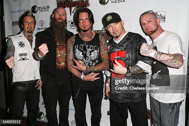 Drummer Jeremy Spencer, bassist Chris Kael, guitarist Jason Hook, guitarist Zoltan Bathory and vocalist Ivan Moody of Five Finger Death Punch attend...