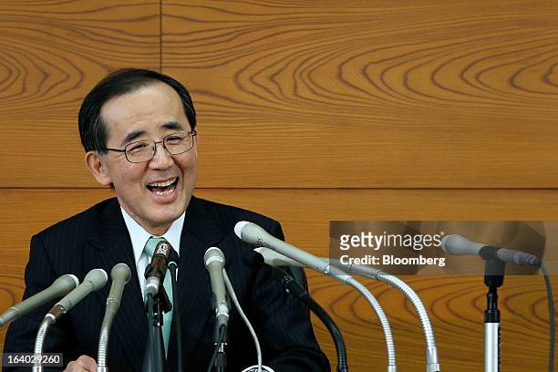 Masaaki Shirakawa, outgoing governor of the Bank of Japan, reacts during a news conference at the central bank's headquarters in Tokyo, Japan, on...