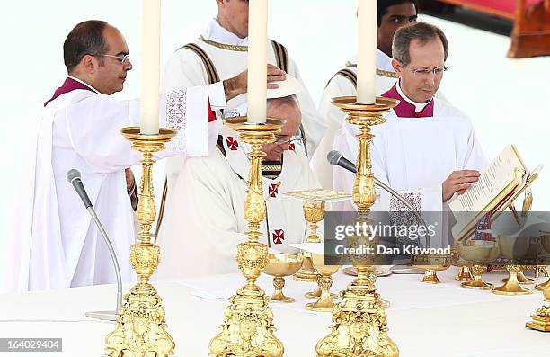 Cardinal places a Zucchetto on the head of Pope Francis during his Inauguration Mass in St Peter's Square on March 19, 2013 in Vatican City, Vatican....