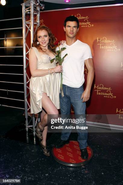 Georgina Fleur unveils the Taylor Lautner wax figure at Madame Tussaud Berlin on March 19, 2013 in Berlin, Germany.