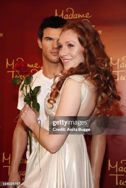 Georgina Fleur unveils the Taylor Lautner wax figure at Madame Tussaud Berlin on March 19, 2013 in Berlin, Germany.