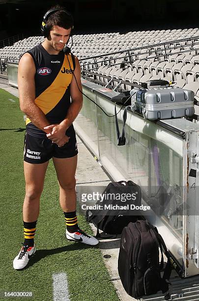 Richmond Tigers captain Trent Cotchin talks to a radio station during the AFL Captains media Day at Etihad Stadium on March 19, 2013 in Melbourne,...