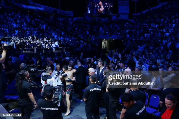 Chan Sung Jung of South Korea prepares to face Max Holloway in a featherweight bout during the UFC Fight Night event at Singapore Indoor Stadium on...