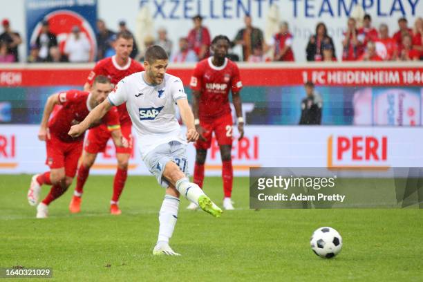 Andrej Kramaric of TSG 1899 Hoffenheim scores the team's third goal from the penalty-spot during the Bundesliga match between 1. FC Heidenheim 1846...