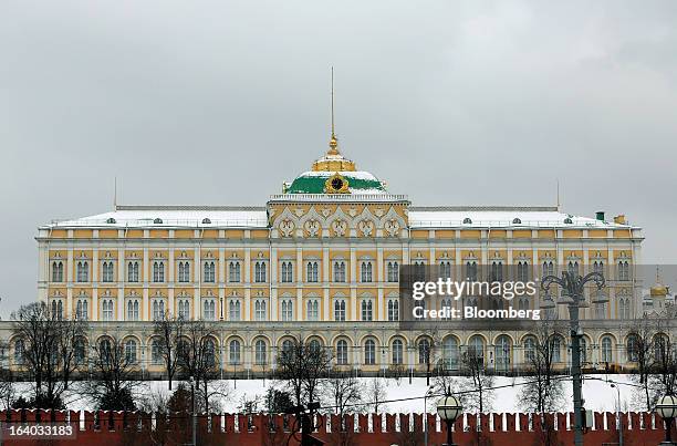 Snow covers the Kremlin as it stands in Red Square in Moscow, on Tuesday, March 19, 2013. Russian stocks fluctuated after the biggest drop in four...