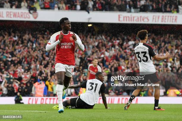 Eddie Nketiah of Arsenal celebrates after scoring the team's second goal during the Premier League match between Arsenal FC and Fulham FC at Emirates...