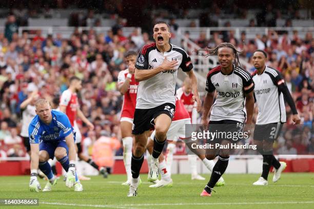 Joao Palhinha of Fulham celebrates after scoring the team's second goal during the Premier League match between Arsenal FC and Fulham FC at Emirates...