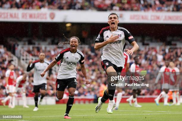 Joao Palhinha of Fulham celebrates after scoring the team's second goal during the Premier League match between Arsenal FC and Fulham FC at Emirates...