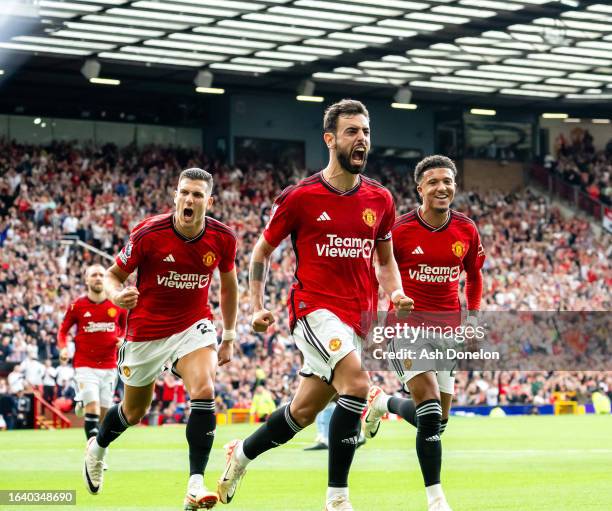 Bruno Fernandes of Manchester United celebrates scoring their third goal during the Premier League match between Manchester United and Nottingham...