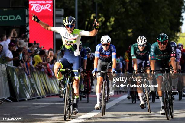 Madis Mihkels of Estonia and Team Intermarché - Circus - Wanty celebrates at finish line as stage winner ahead of Quinten Hermans of Belgium and...