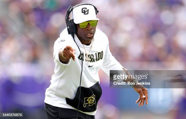 Head coach Deion Sanders of the Colorado Buffaloes celebrates a touchdown against the TCU Horned Frogs during the first half at Amon G. Carter...