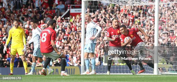 Casemiro of Manchester United celebrates scoring their second goal during the Premier League match between Manchester United and Nottingham Forest at...